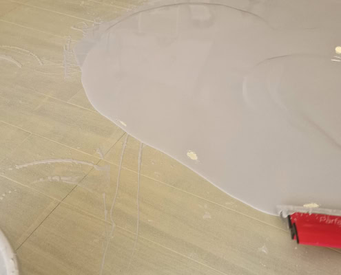 Cast floor Over Existing Tiles